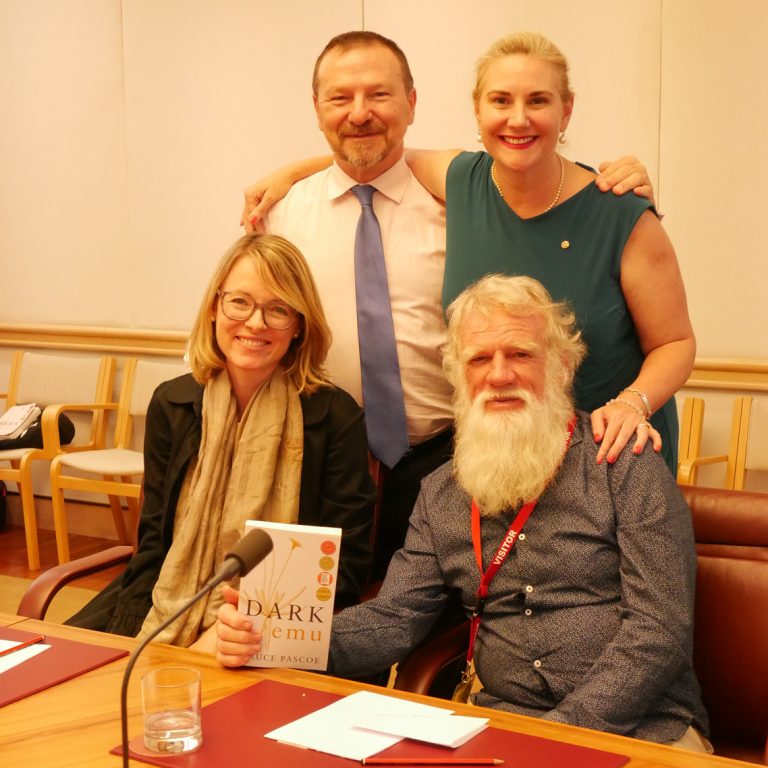 ruce Pascoe and Anna  Moulton from Magabala with Grahame and Hollie, holding the Dark Emu book